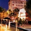 Outdoor dining in the midst of the sights of the nighttime cityscape