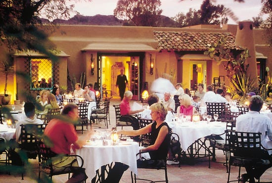 Diners take advantage of Lon's welcoming outdoor patio.
