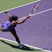 Serena Williams stretches for the ball.