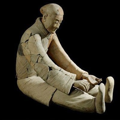Seated musician, Qin Dynasty (221-206 BC)
Terracotta, 35 inches. Museum of the Terracotta Warriors and Horses of Emperor Qin Shihuang, Lintong. &Acirc;&copy; The Trustees of The British Museum with the kind permission of the Shaanxi Cultural Heritage Promotion Cente