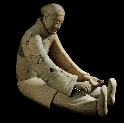 Seated musician, Qin Dynasty (221-206 BC)
Terracotta, 35 inches. Museum of the Terracotta Warriors and Horses of Emperor Qin Shihuang, Lintong. &Acirc;&copy; The Trustees of The British Museum with the kind permission of the Shaanxi Cultural Heritage Promotion Cente