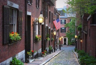 Narrow streets and overflowing window boxes offer quaint appeal