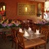 Try one of the house specialties,  Panang curry duck