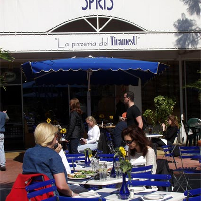 Patrons enjoying the outdoor dining option at Spris