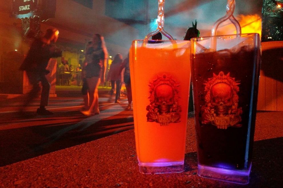 Liquid Courage (left) and Liquid Fear. First one's $12.99; refills $8.99. The scareactor who nearly causes you to spill both while taking a picture is included in the price of admission.