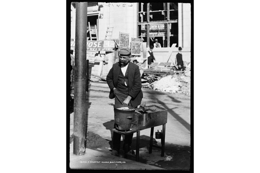 A street vendor in Baltimore sells roasted chestnuts