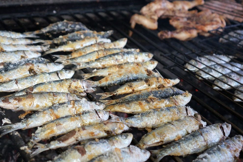 Fresh, grilled sardines rule the culinary scene during the summer season