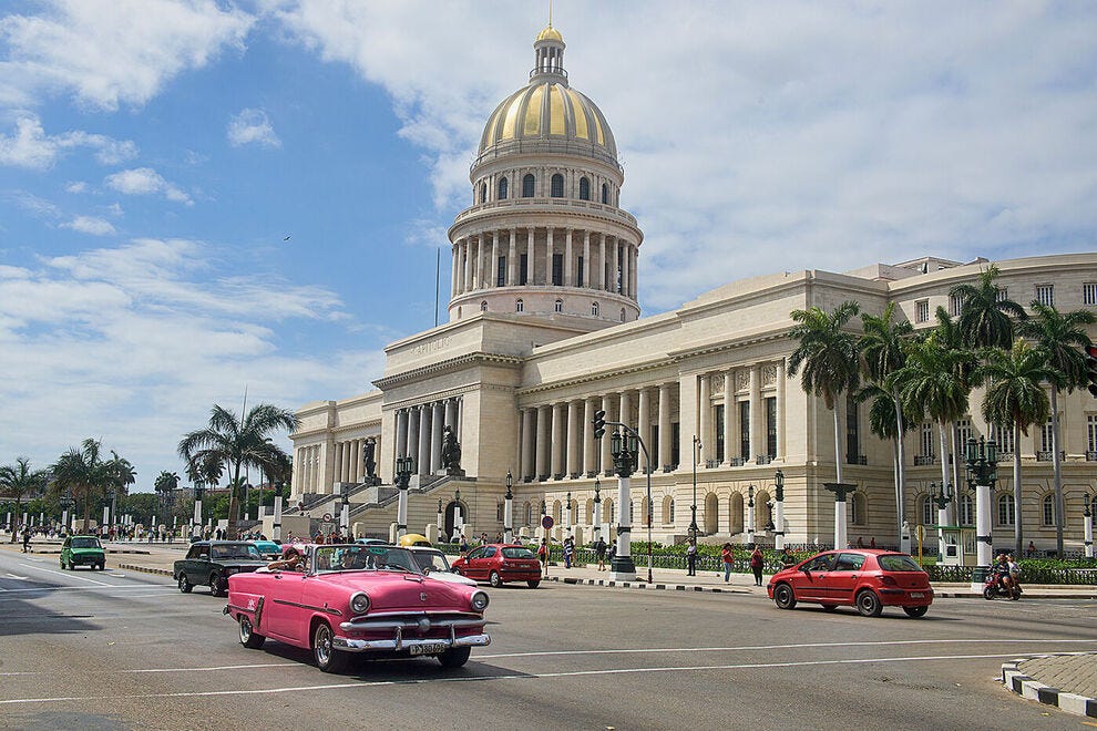 El Capitolio and a vintage car