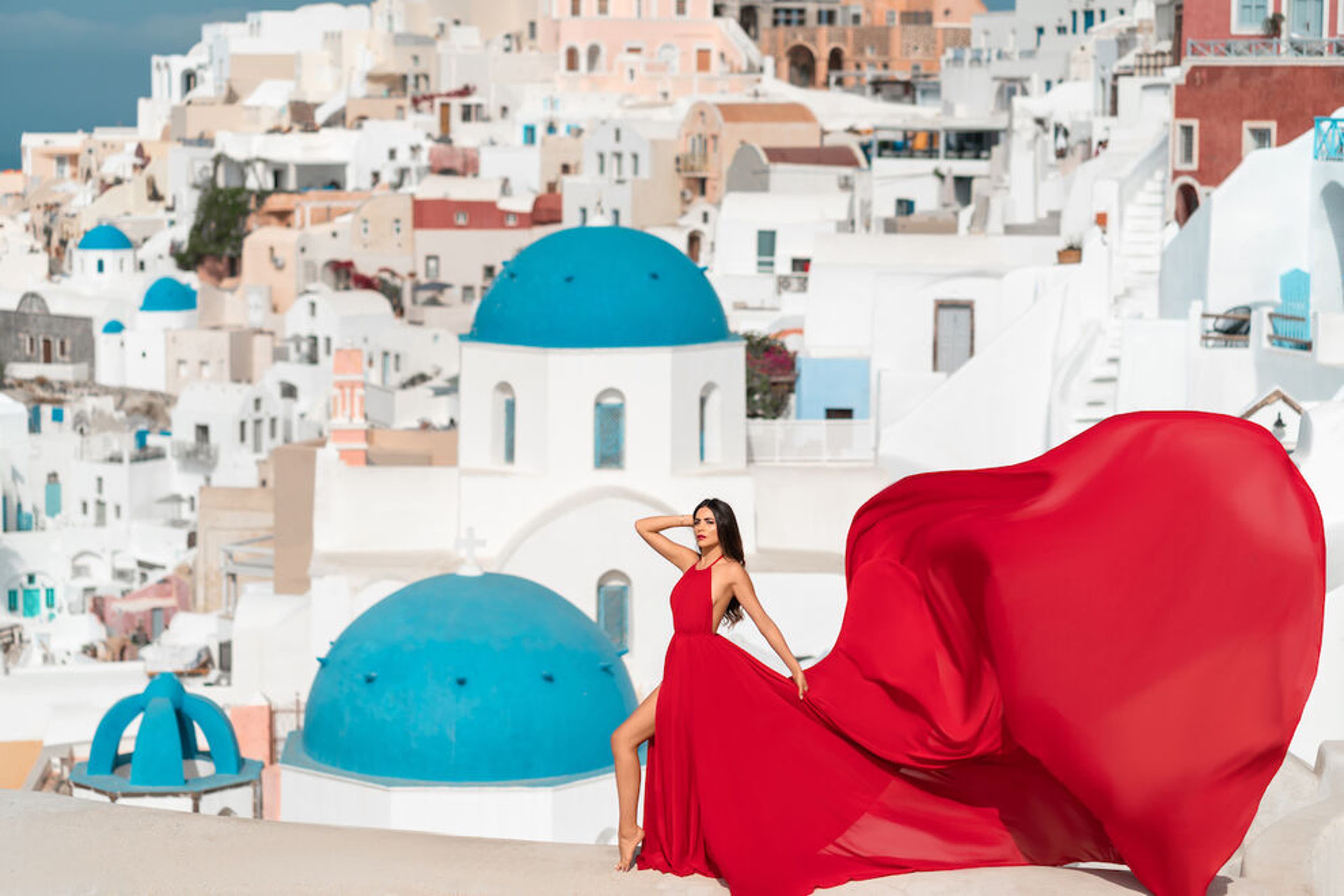 How to book a beautiful flying dress photo shoot in Santorini