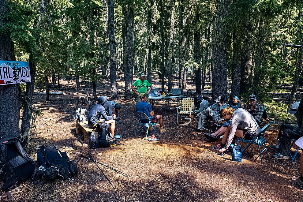 Hikers being treated to hot dog "trail magic"