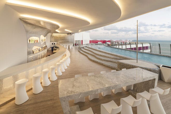 The rooftop pool and bar at Temptation offers gorgeous views