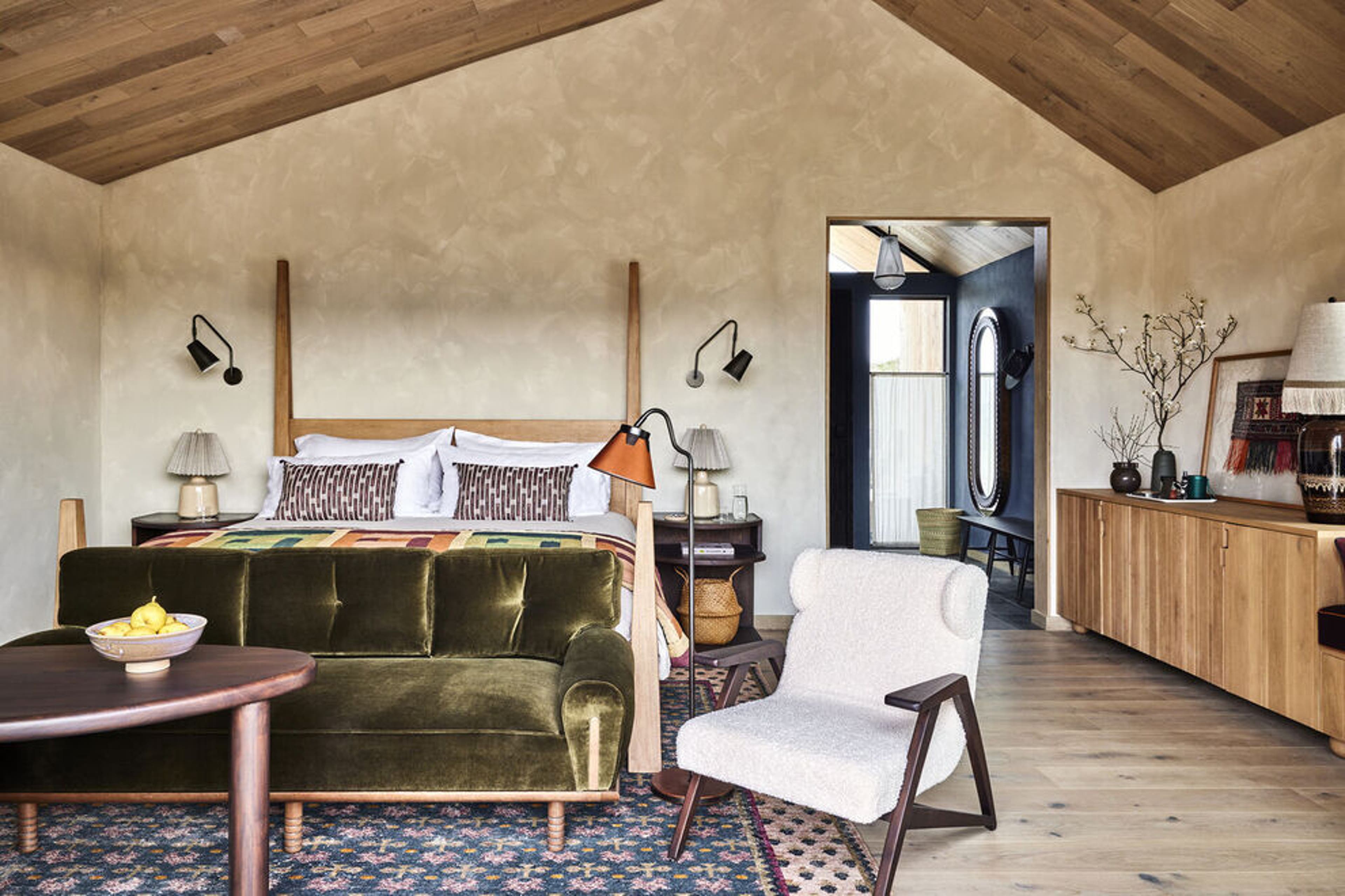 Rooms at Wildflower Farms are decorated with custom furniture.