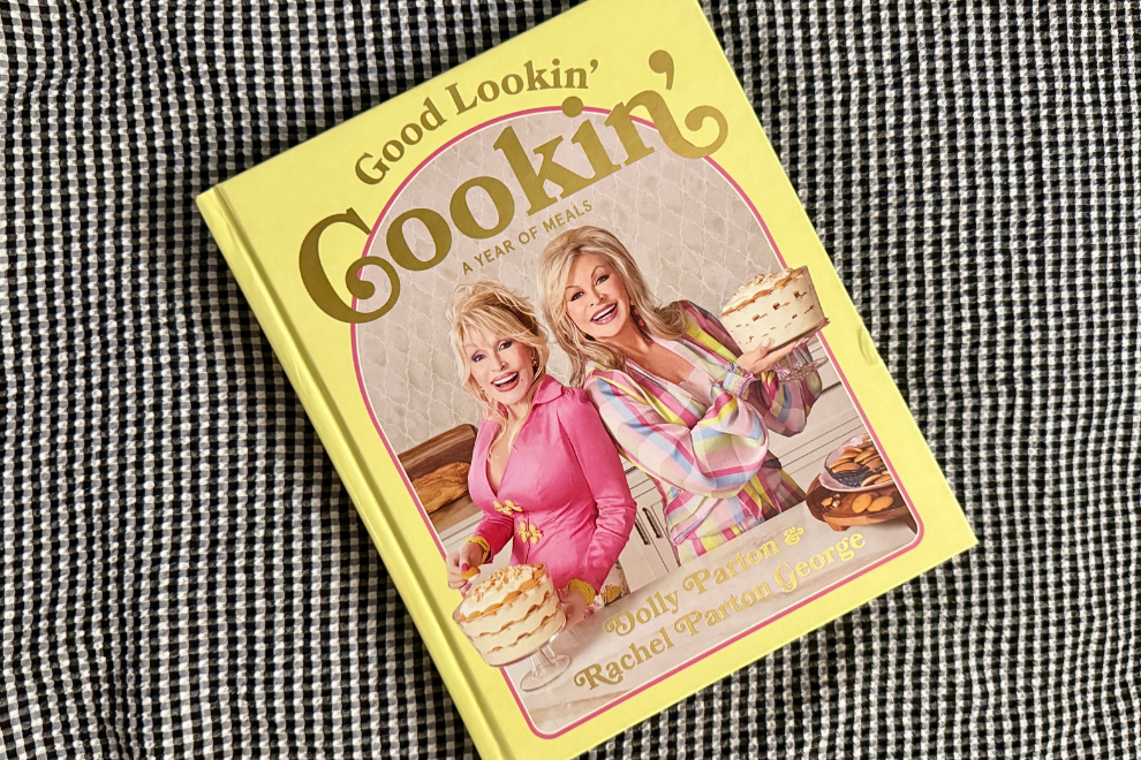 A photo of Dolly Parton's cookbook, "Good Lookin' Cookin'" with Southern recipe inspiration for a more flavorful life.